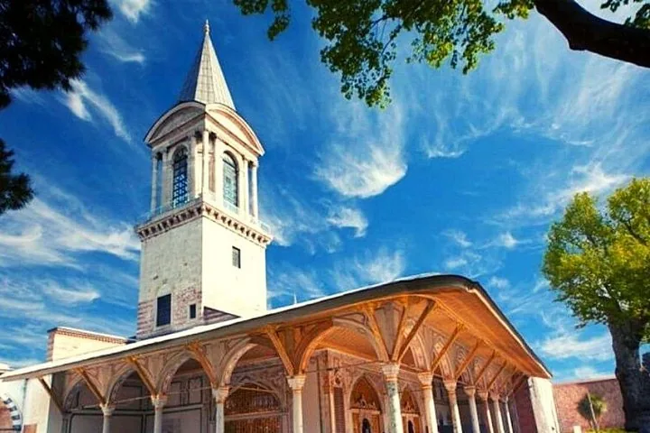 Tower of Justice and surrounding palace buildings against a blue sky